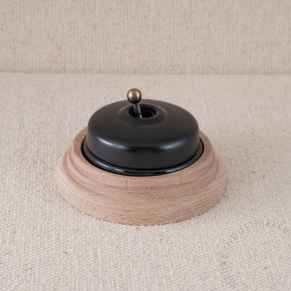 Interrupteur Dimbler dôme métal base porcelaine noire socle bois
